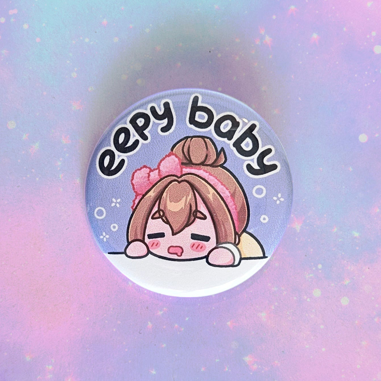 Circular sticker with cartoon character and 'eepy baby' text on a pastel gradient background