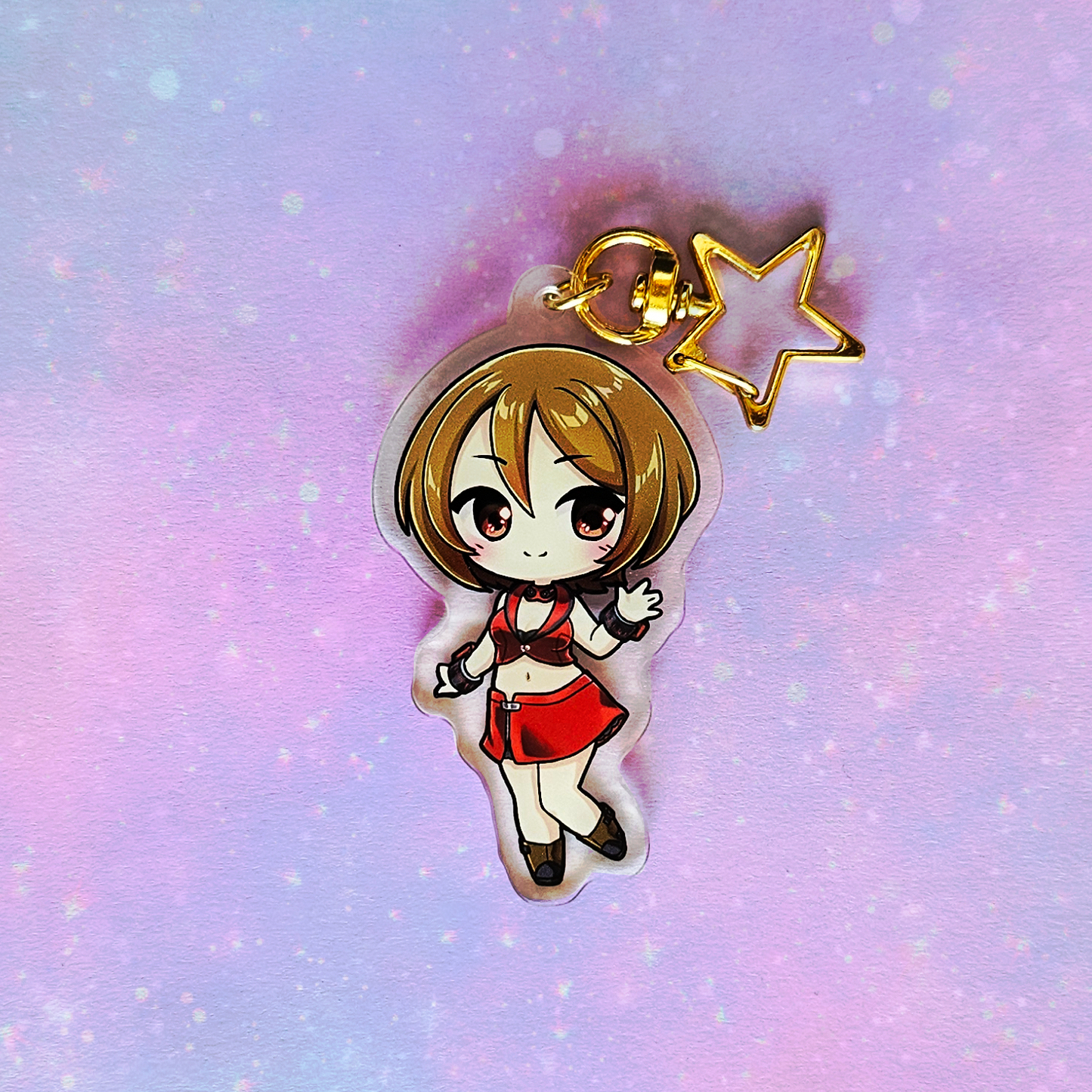 Anime character charm with a star on a pastel gradient background