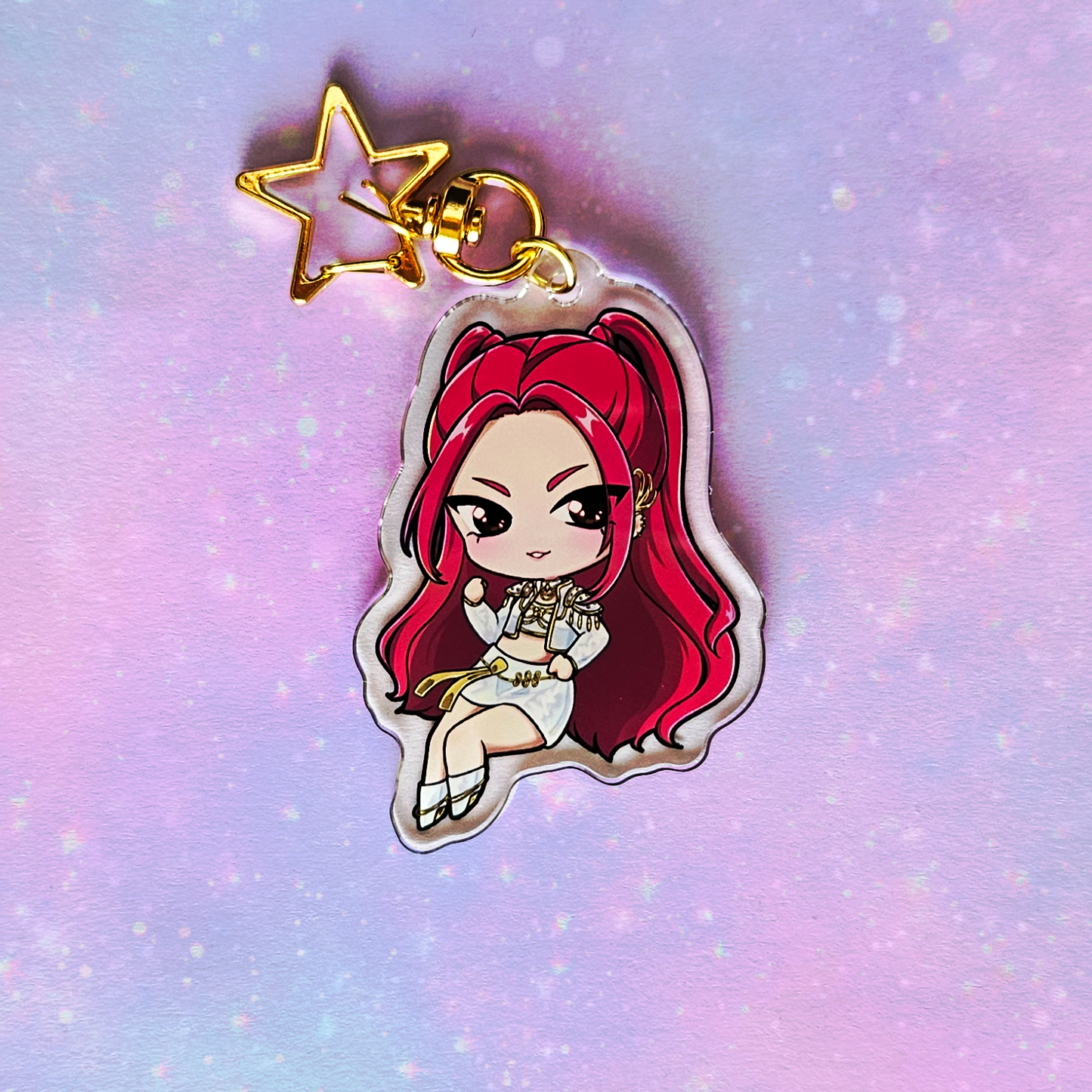 Keychain with cartoon character on a pastel gradient background