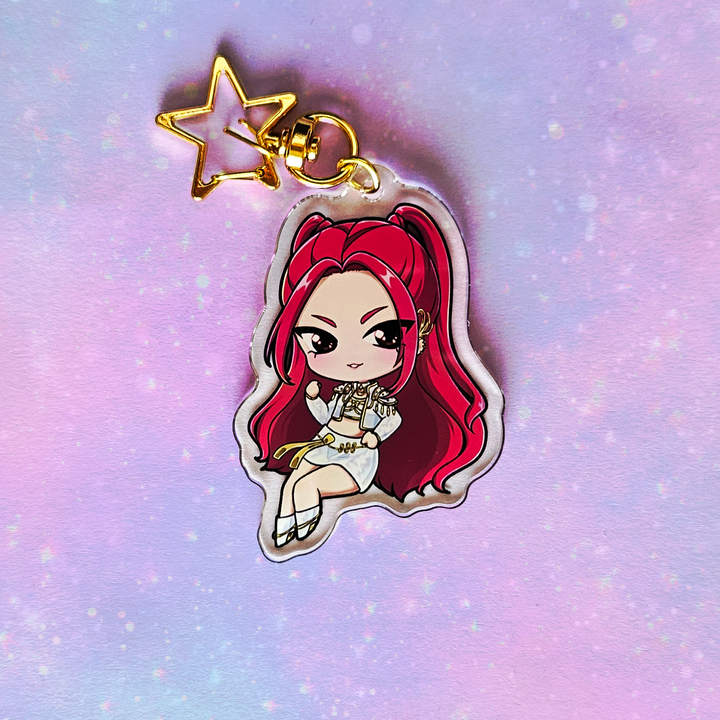 Keychain with cartoon character on a pastel gradient background
