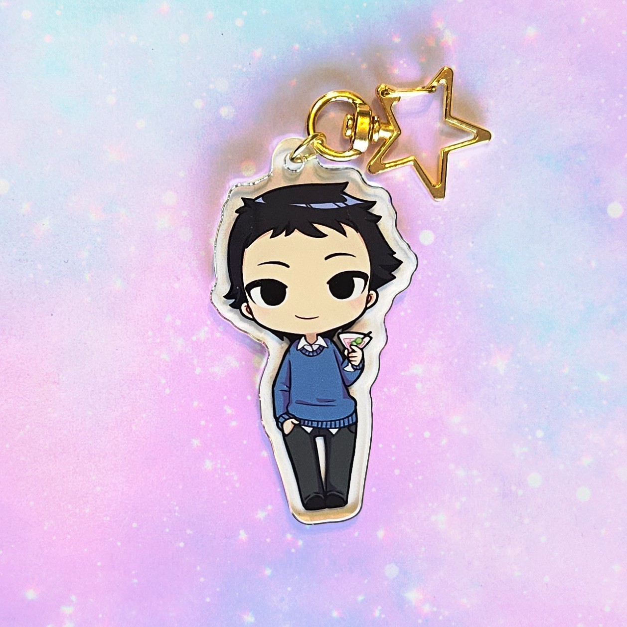 Character charm with a star on a pastel gradient background